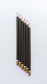 Row of sharp black pencils isolated on a pure white background 스톡 사진