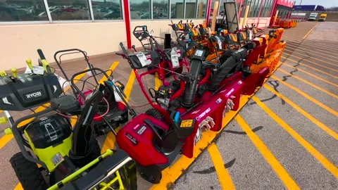 Row of Snow Blowers Outside a Store - Davenport, Iowa - January 5, 2024 Stock Footage 260836686