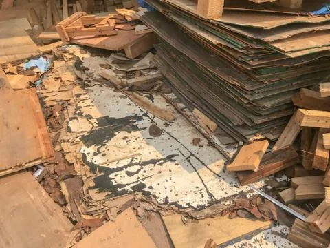 Row stack of wood in storage warehouse Stock Photos