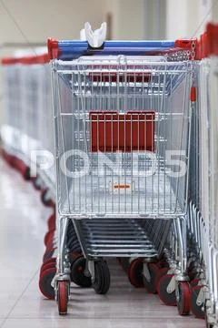 Row Of Stacked Supermarket Trolleys