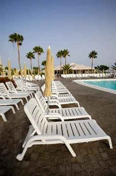 Row of sunbeds Stock Photos
