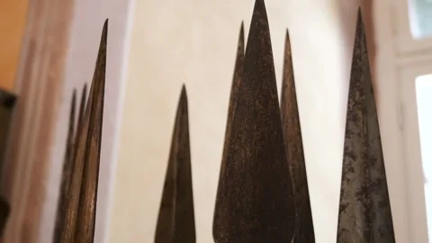 Row of tall spearhead points palace armoury grand master's palace valletta Stock Footage 341773271