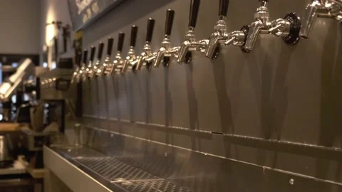 A row of taps in a craft beer bar 動画素材 234483865