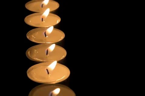 Row of tea candles Stock Photos