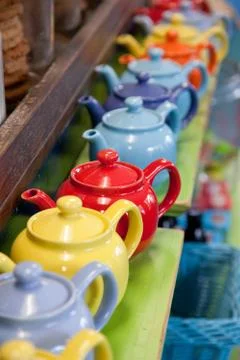 Row of tea pots Stock Photos