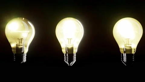 A Row of three lightbulbs tuning on Stock Footage 155226624