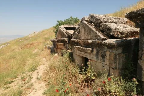 Row of three sunken tombs at the upper Necropolis of the ancient site of Hier Stock Photos