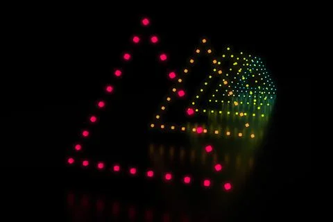 Row of triangle shaped multi colored LED lights Illustrazione stock