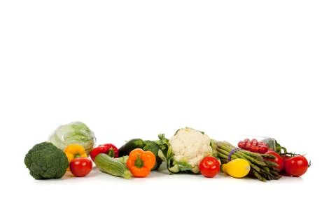 A row of vegetables on white with copy space Stock Photos