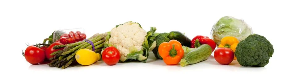A row of vegetables on white Stock Photos