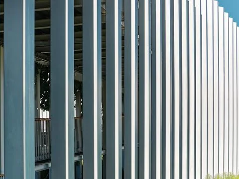 Row of Vertical Pillars Pattern with Lights and Shadows Stock Photos