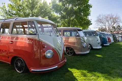 Row of Volkswagen Buses Viewed from the Front Right Side Stock Photos