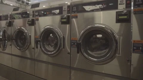 Row of washing machines in the process of working Stock Footage 157499244