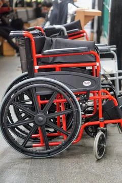 A row of wheelchairs provided for accessibility services for disabled Stock Photos