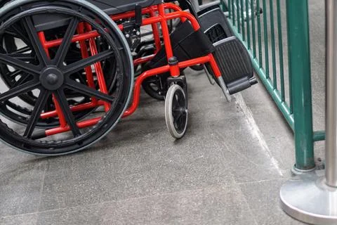 A row of wheelchairs provided for accessibility services for disabled Stock Photos