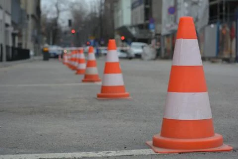 Row of white and orange traffic cones Stock Photos