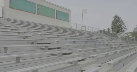 Row of white bleachers in the stadium Stock Footage 69740049