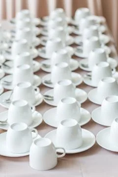 Row of white coffee cups Stock Photos