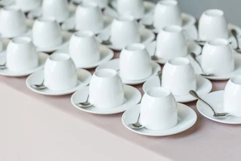 Row of white coffee cups Stock Photos