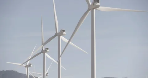 Row of Wind Mills In Motion Stock Footage 89942429