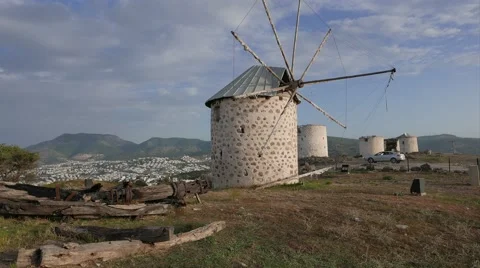 Row of windmill towers on the top of the hill. 4k Stock Footage 62799096