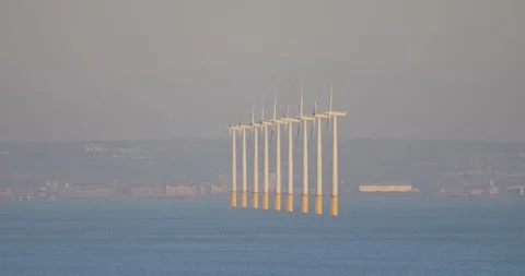 Row of windmills in the sea Stock Footage 127427372