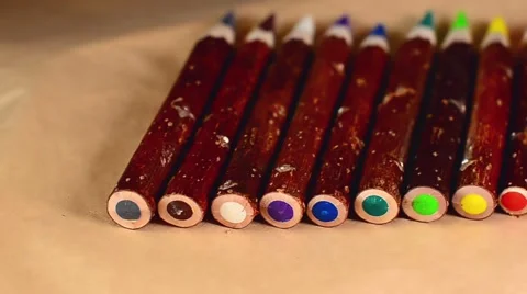 Row of Wood Colour Pencils on Brown Paper Background close up Видео 59087102