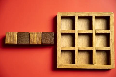 Row of wooden square cubes on colored background. Template or Copy space Stock Photos