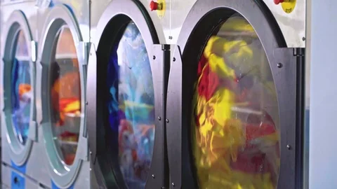 Row of working washing machines in a Laundry Stock Footage 84096418