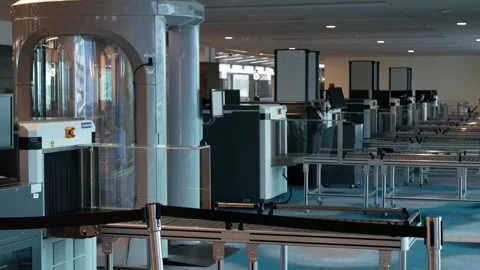 Row of X-ray machines and body scanner for detecting prohibited items in lu.. Stock Footage 291795740