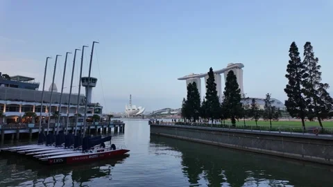 A row of yachts are docked in the water at Marina Bay Sailing 스톡 동영상 318101853