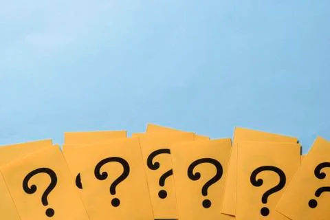 Row of yellow question marks forming a border Stock Photos