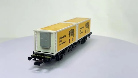 Rowa model of a German container railway wagon with beer containers Video stock 320842140
