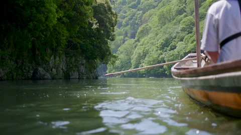 Rowboat Entering Arashiyama on Hozu River - Kyoto, Japan Stock Footage 336830248