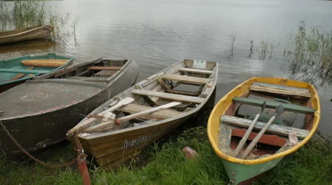 Rowboat on the lake shore Stock Footage 68945954