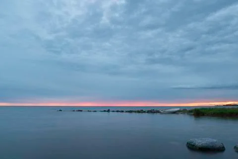 Rowboat by Ocean at Sunset Stock-Fotos