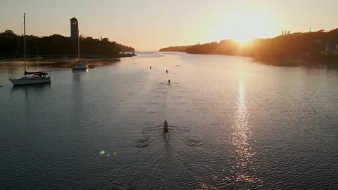 Rowboat Rowers Practice During a Beautiful Sunrise in Halifax Harbor, Canada. Stock Footage 254372132