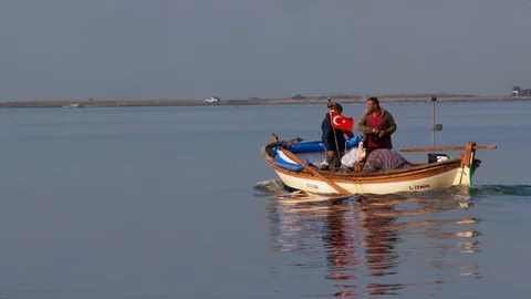 Rowboat sailing across the frame Stock Footage 104123530
