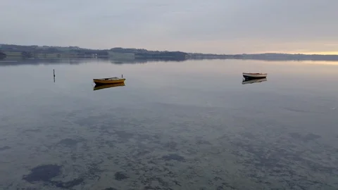 Rowboats floating Denmark Stock Footage 102920094