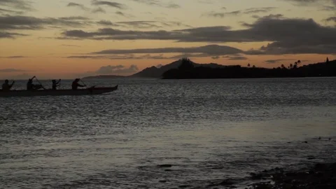 Rowers at Dusk in Oahu Stock Footage 73160195