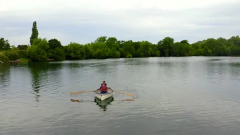 Rowers on lake Stock Footage 220793128