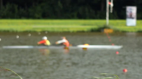 Rowers pass finish line | Stock Video | Pond5
