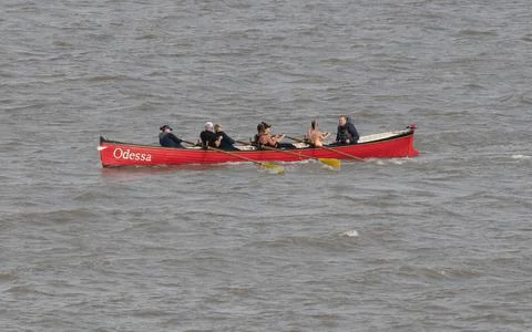 Rowers on a river Stock-Fotos