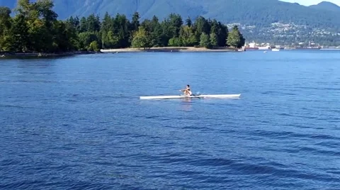 Rowers training on the ocean Stock Footage 41299497