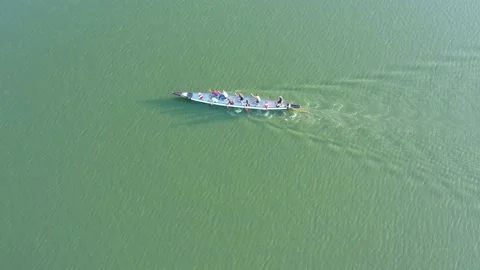 Rowing and canoeing. Aerial view from a drone on the sea surface Stock Footage 157991126