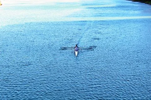 Rowing on Arno River: Two Rowers in Florence Italy, Aerial Top View Stock Photos