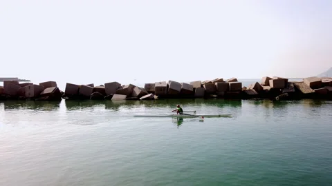 Rowing athlete. Frontal shot in broad daylight Stock Footage 220025096