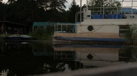 Rowing boat approaching to old abandoned ship Stock Footage 68944626