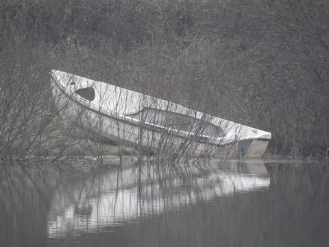 Rowing boat in mist Stock Photos