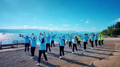 Rowing Boat racing in Competition along Coast with Aerial Drone. Video stock 324890554